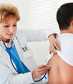 Doctor examining the breathing sounds of the lungs A female doctor examining, with a stethoscope, the breathing sounds of the lungs