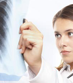 Family Doctor examaning an X-Ray investigation radiography Family Doctor examaning an X-Ray investigation radiography