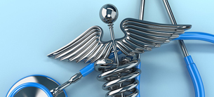 Close-up image of a stethoscope and a caduceus, the symbol of Commerce (the Greek God Mercury Close-up image of a stethoscope and a caduceus, the symbol of Commerce (the Greek God Mercury), not of Medicine